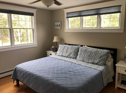 Harwich Cape Cod vacation rental - Master bedroom with king bed, private bath, and full closet.