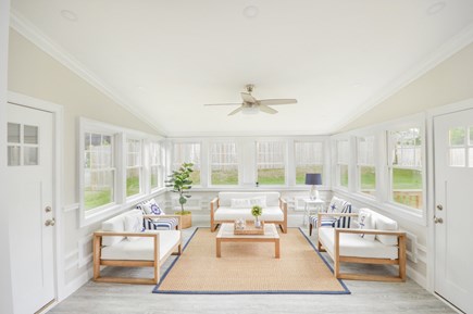 Falmouth Cape Cod vacation rental - Sun Room overlooking the deck and backyard