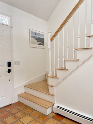 Harwich Port Cape Cod vacation rental - The front hallway with staircase