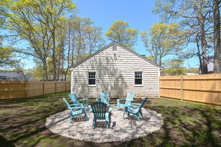Centerville Cape Cod vacation rental - Fenced in yard with fire pit