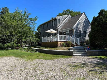 Brewster Cape Cod vacation rental - Large sunny deck overlooks private back yard