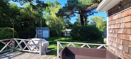 Yarmouth Cape Cod vacation rental - Private patio, with table for 8, sun umbrella and love seat.