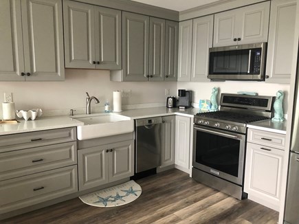 Dennisport Cape Cod vacation rental - Kitchen with stainless appliances and gas stove
