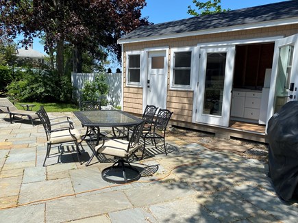 Pocasset Cape Cod vacation rental - Outdoor patio with dining table and grill