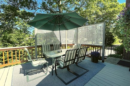 Yarmouth Cape Cod vacation rental - Outdoor dining table with privacy fence