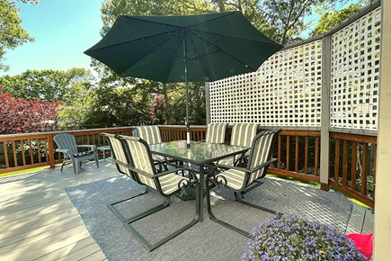 Yarmouth Cape Cod vacation rental - Outdoor dining table with fairy lights seats 6