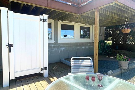 Dennis Cape Cod vacation rental - Outdoor Shower and Patio Table on Lower Level