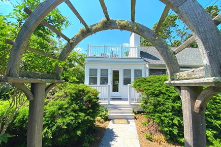 Yarmouth Cape Cod vacation rental - Entrance to courtyard with arbor trellis
