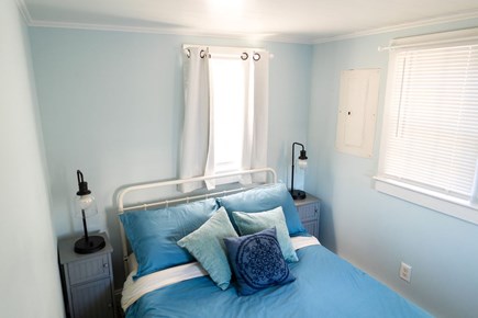 Yarmouth Cape Cod vacation rental - Full size bed, side table and lamps.