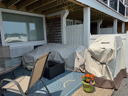 Yarmouth, Bass River Cape Cod vacation rental - Patio with Grill, table and chairs and a L shaped wicker couch