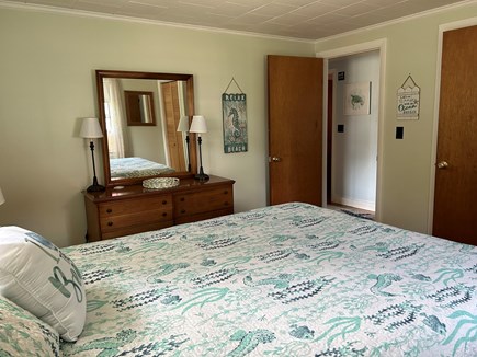 Dennis Port Cape Cod vacation rental - Another view of primary bedroom looking into hallway