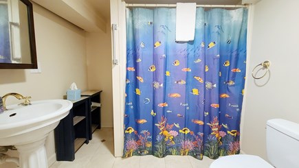 Truro Cape Cod vacation rental - Lower level bathroom with tub/shower