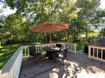 Dennis Cape Cod vacation rental - Backyard deck, patio, outdoor shower, grill