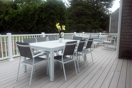 Dennis Village Cape Cod vacation rental - Back Deck is accessed from two sets of large Sliding Glass doors.