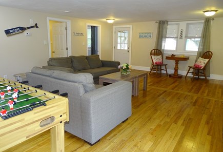 Dennis Port Cape Cod vacation rental - Living room view facing entrance to back patio