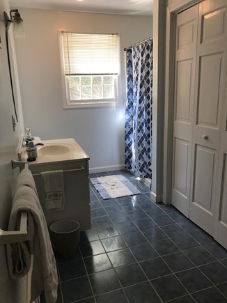 North Truro Cape Cod vacation rental - First floor bath with washer/dryer
