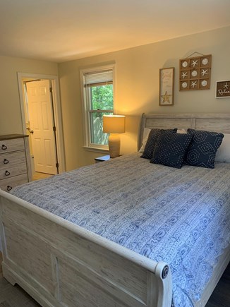 South Yarmouth Cape Cod vacation rental - Primary bedroom with full en-suite bath, A/C and TV
