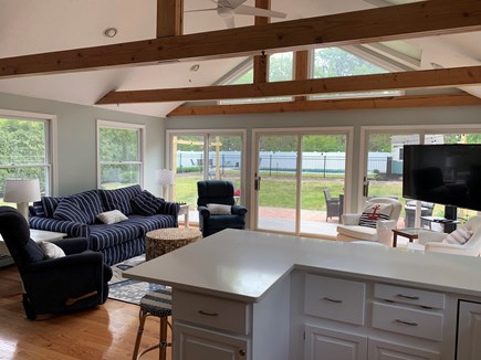 Harwich Cape Cod vacation rental - Sunroom w/ cathedral ceiling overlooking the patios and backyard