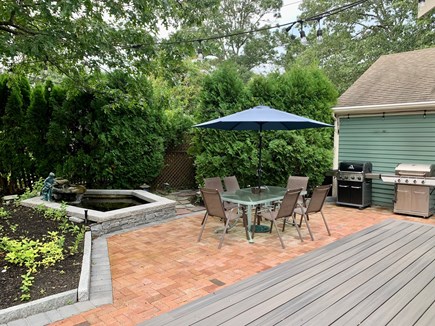 Harwich Cape Cod vacation rental - Enjoy a family meal or a good book next to a relaxing fountain.
