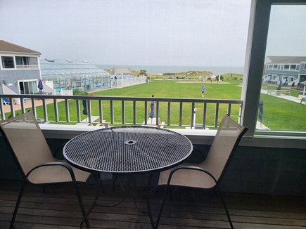 Dennis Port Cape Cod vacation rental - Relax on balcony overlooking spacious lawn