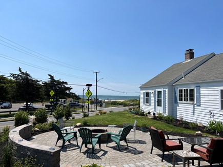 Hyannis Cape Cod vacation rental - Patio with firepit overlooking ocean