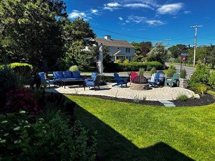 Hyannis Cape Cod vacation rental - Beautiful large sitting area with fire pit overlooking ocean.
