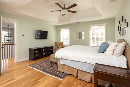 Marion MA vacation rental - Primary bedroom w huge master bath, the bed is a California King