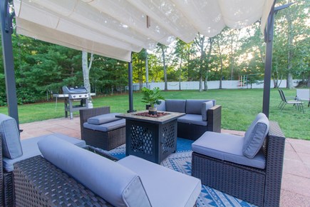 Barnstable Cape Cod vacation rental - Outdoor - Lounge Area with pergola and 3 burner BBQ grill