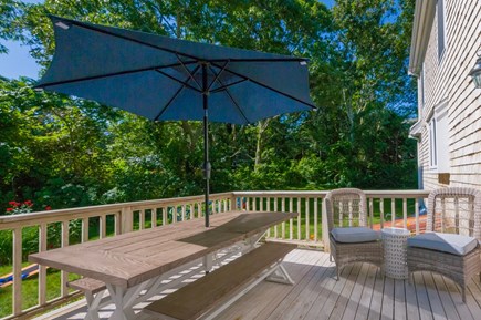 East Sandwich Cape Cod vacation rental - Deck with table, seating and grill off Dining Room