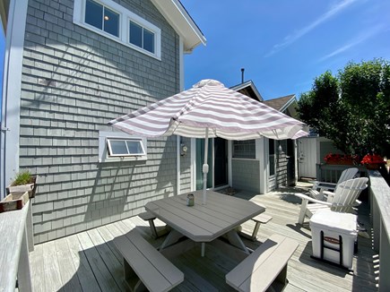 Brewster Cape Cod vacation rental - Picnic table with 4 benches, 2 adirondack chairs, outdoor shower