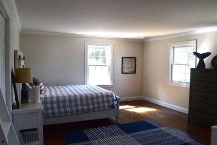 South Yarmouth Cape Cod vacation rental - 2nd floor bedroom woth queen bed and twin over double bunk bed
