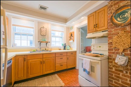 Sagamore Beach Cape Cod vacation rental - Fully equipped kitchen next to large dining room.