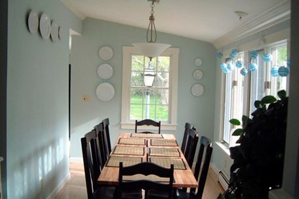 West Harwich Cape Cod vacation rental - Dining area with long custom table, main house