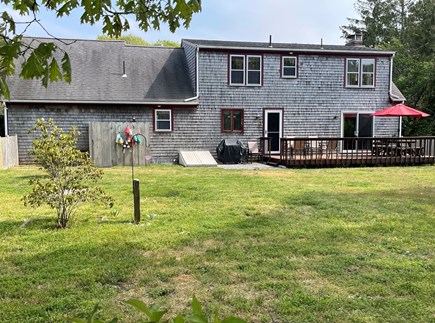Eastham Cape Cod vacation rental - Large fenced-in back yard; outdoor shower and deck