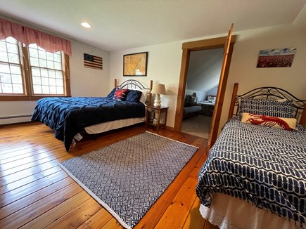 North Eastham Cape Cod vacation rental - Second floor bedroom with queen & twin leads to bonus kids' space