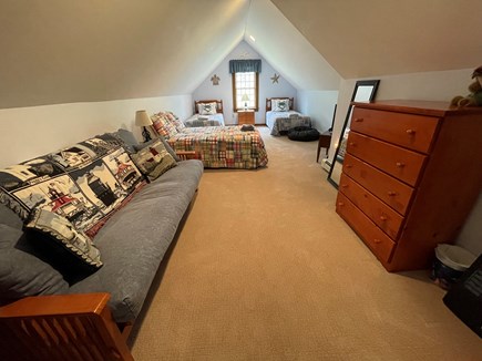 North Eastham Cape Cod vacation rental - Kids' sleep space with two twins and a full, plus toy box and TV