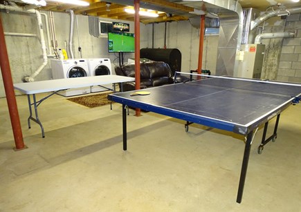 Harwich Cape Cod vacation rental - Basement area with laundry, ping pong, Golden Tee golf, and darts