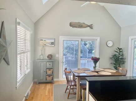 Harwich Cape Cod vacation rental - Bright vaulted dining room with ceiling fan, opens to deck