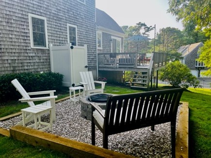Harwich Cape Cod vacation rental - Back yard with outdoor shower and brand new fire pit