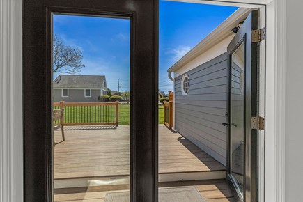 Yarmouth, Wimbledon Shores Cape Cod vacation rental - French doors lead outside to new sprawling deck.