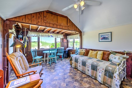 East Sandwich Cape Cod vacation rental - Living Room with table, seating and Trundle day bed