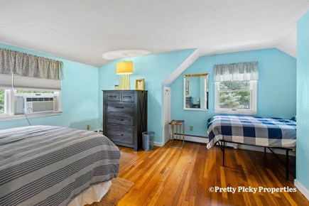 Brewster Cape Cod vacation rental - Another view of the second floor bedroom with a full-size double and a twin bed. Wall mounted mini splits have replaced the window unit AC