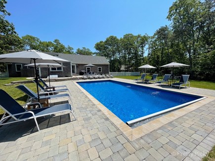 Brewster Cape Cod vacation rental - Another look at the patio outside dining table and chairs.
