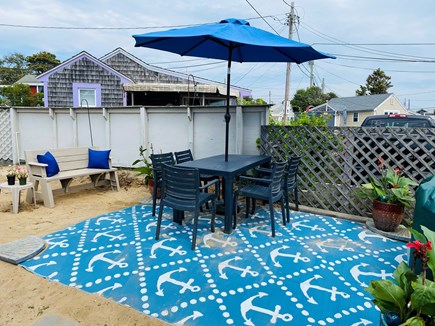 DennisPort, Chases Ocean Grove Cape Cod vacation rental - Outdoor eating and sitting area and bbq
