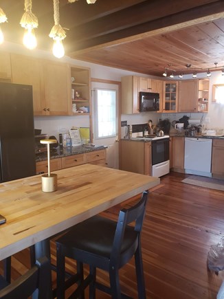 Onset MA vacation rental - View from interior dining towards back door and kitchen