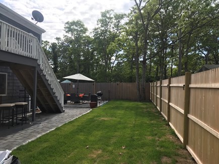 South Yarmouth Cape Cod vacation rental - Back yard fenced in