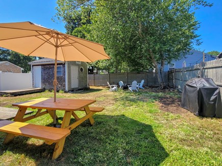 Yarmouth, Nauset Escape Cape Cod vacation rental - Outdoor eating area/fenced in yard