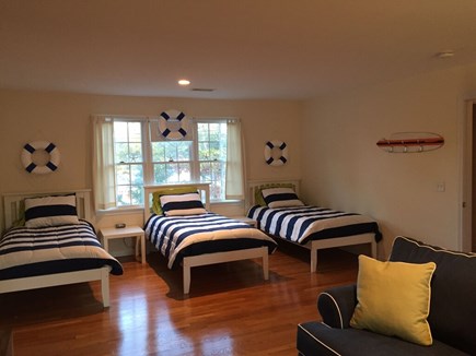 Chatham Cape Cod vacation rental - Large bedroom, with three twins and pullout couch