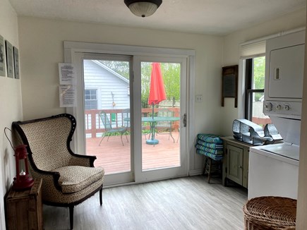 Plymouth MA vacation rental - Back room with new first floor washer and dryer. Walk out deck.