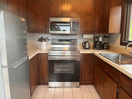 Wellfleet Cape Cod vacation rental - Kitchen with Fridge, new Oven and Microwave.